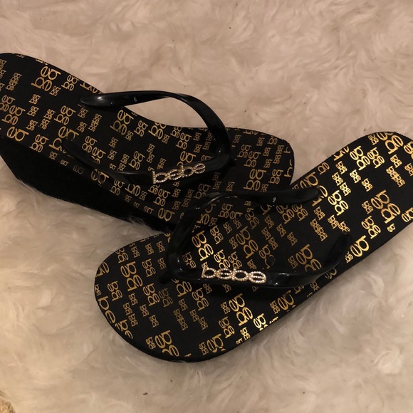 bebe Shoes - BeBe rhinestone platform flip flop sandals.